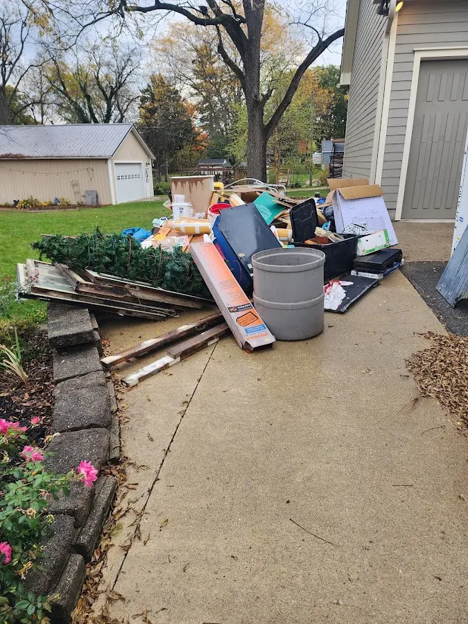 Dumpster being loaded with debris for 3 Yard Dumpster Rental in Platteville